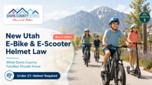 Family riding e-bikes and e-scooters on a Davis County trail with helmets, highlighting Utah’s new e-bike and e-scooter helmet law.